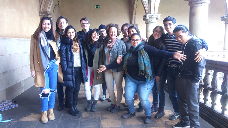 The students pose for a photo with Ruth Mestre.